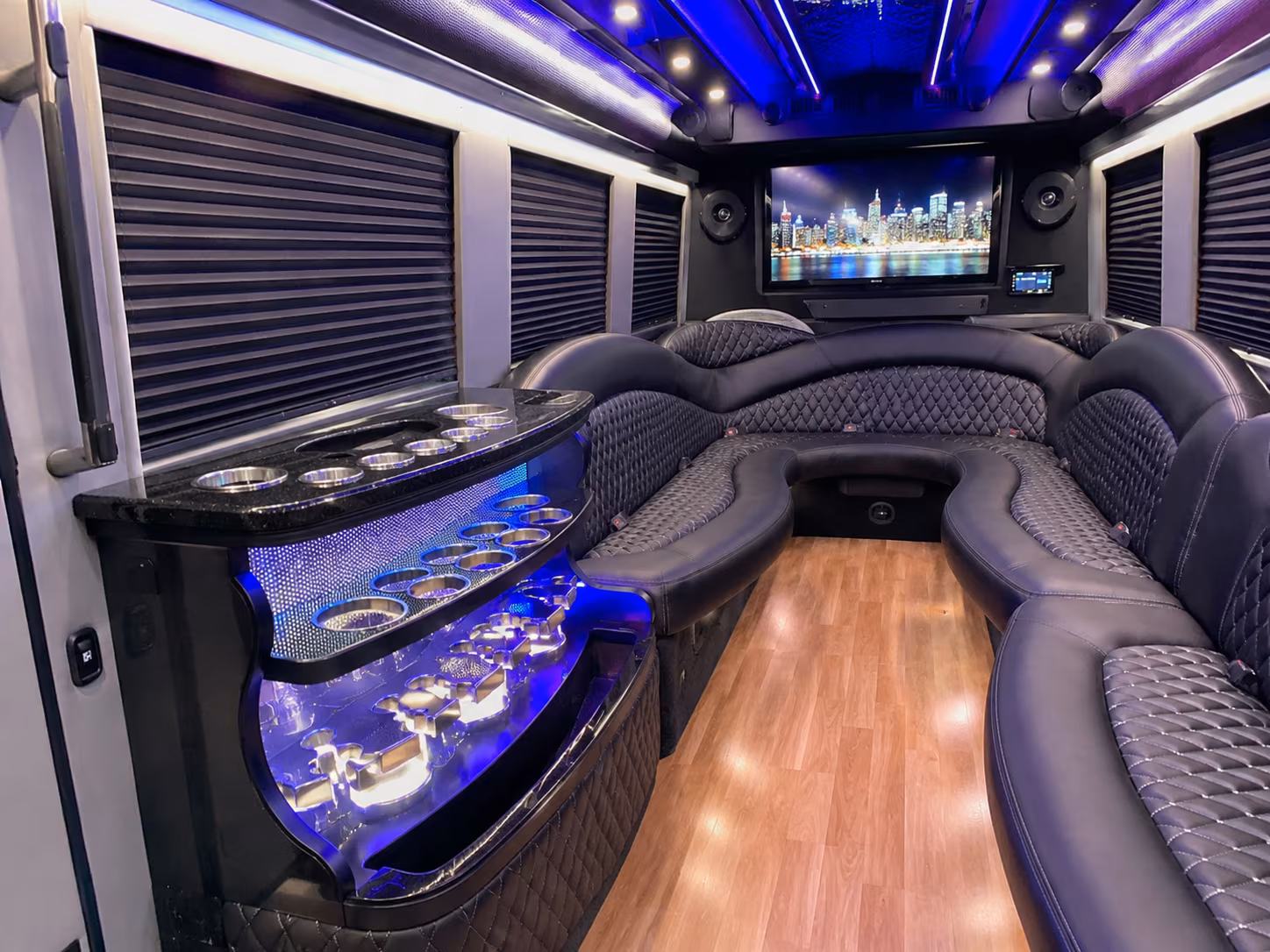 Wedding guests seated inside a party bus serving Austin