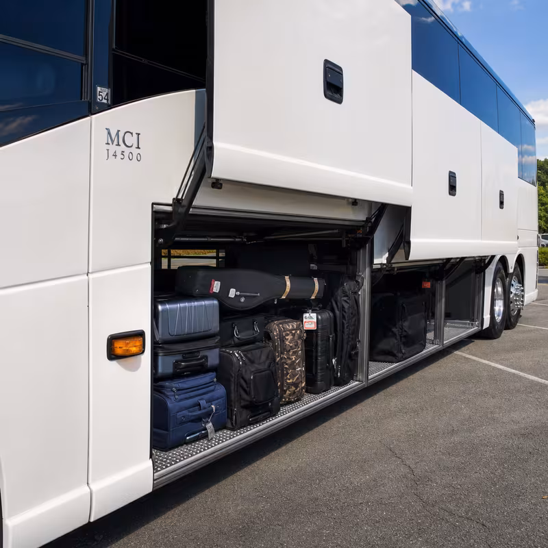 Party bus interior with wraparound leather seating and LED lighting in Austin