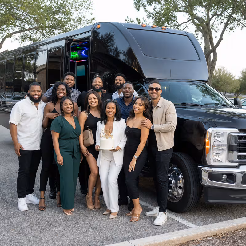 Group boarding a white charter bus for Birthday Transportation transportation in Austin