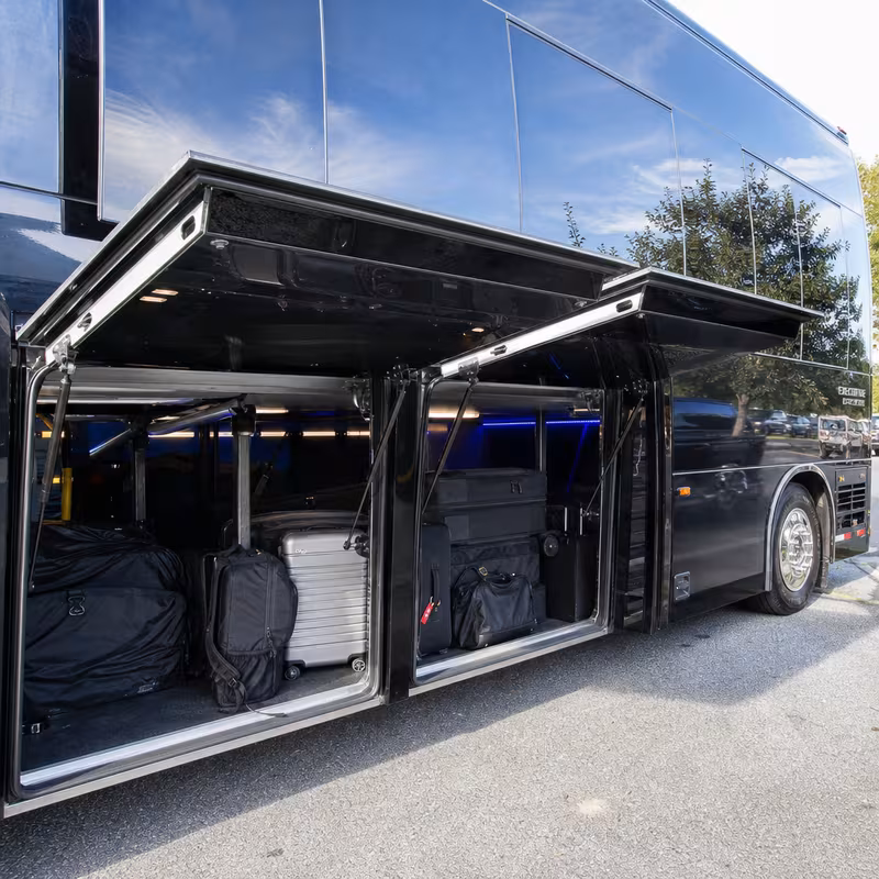 Party bus interior with wraparound leather seating and LED lighting in Austin