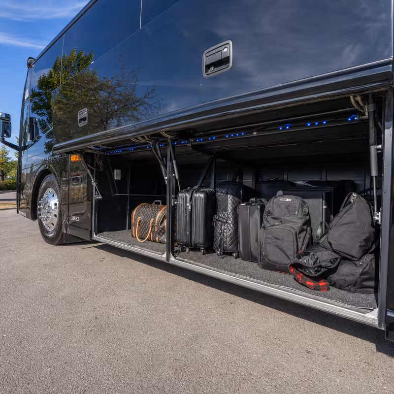 Party bus interior with wraparound leather seating and LED lighting in Austin